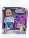 Baby doll with bottle, towel and kitchen utensils